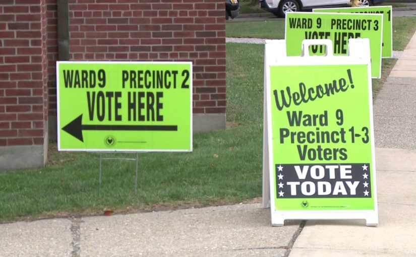 Signs pointing to voting locations